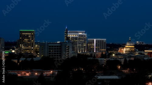 Skyline of Boise Idaho seen at night with deep dark blue sky