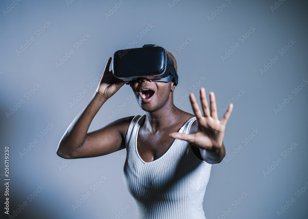attractive curious black afro american woman wearing VR 3d visio attractive curious black afro american woman wearing VR 3d visio