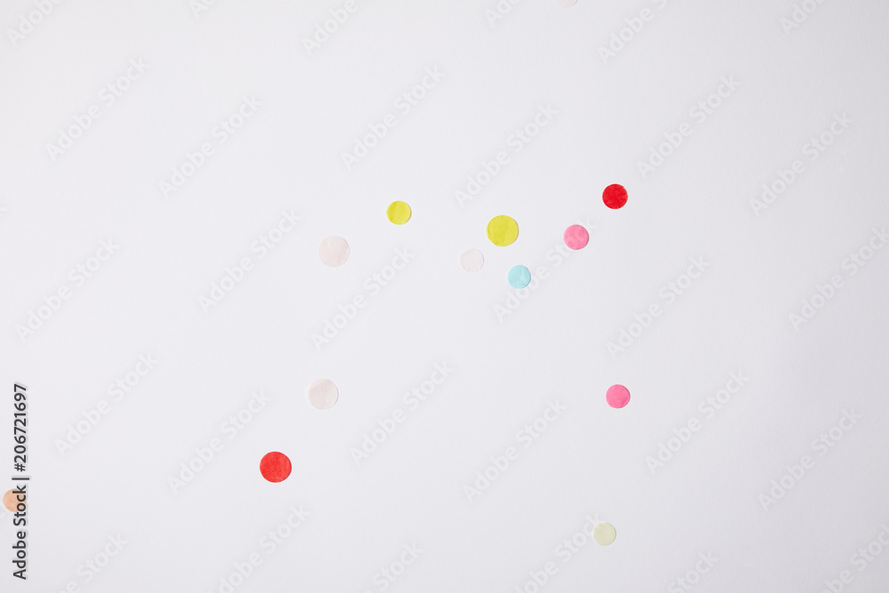 top view of colored confetti pieces isolated on white top view of colored confetti pieces isolated on white