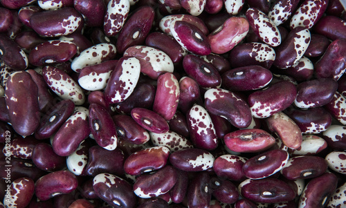 Close up Red white beans background and as a texture. Healthy vegetarian dietary food rich in microelements. Healthy lifestyle food. photo