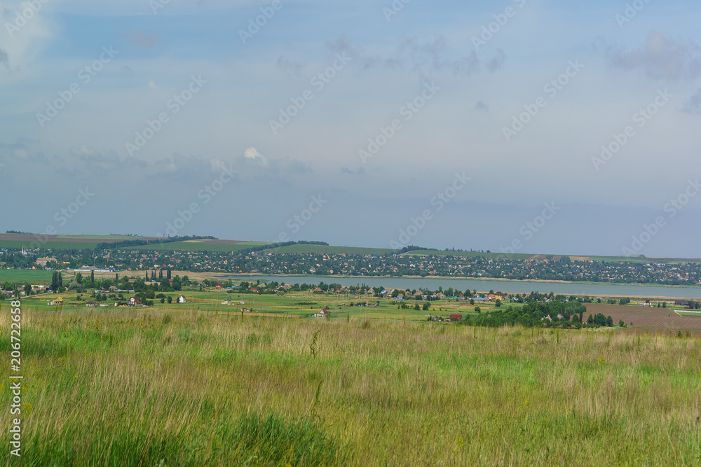 Fototapeta premium Views over the estuary and the village of Starotitarovskaya the Temryuk district of Krasnodar region