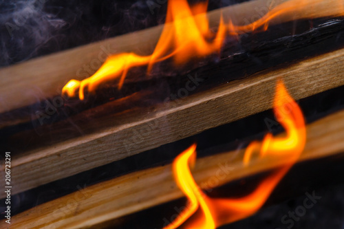 Glowing hot charcoal briquettes close-up background texture. bonfire