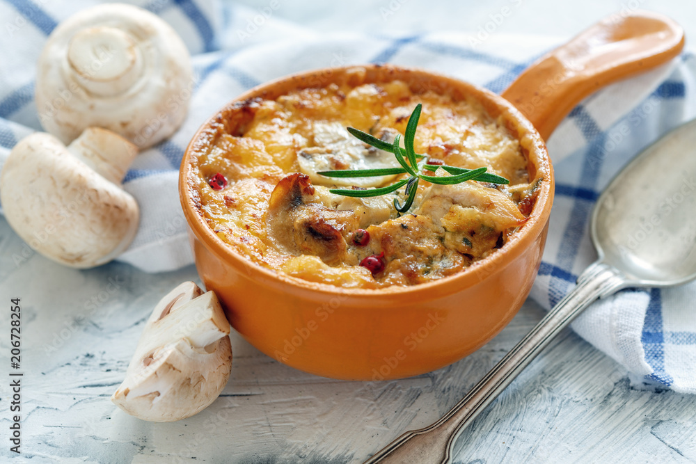 Clay pot with fried mushrooms,chicken and cheese. Clay pot with fried mushrooms,chicken and cheese.