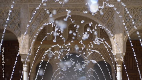 Alahambra Palace,Granada,Spain: Fountain pouring water 