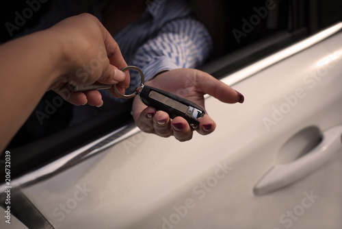 Woman buying a car.