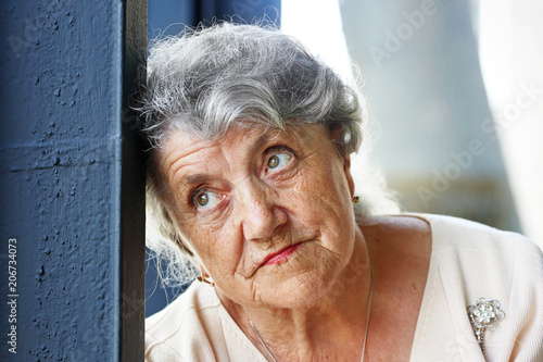 Elderly woman tired and sad face