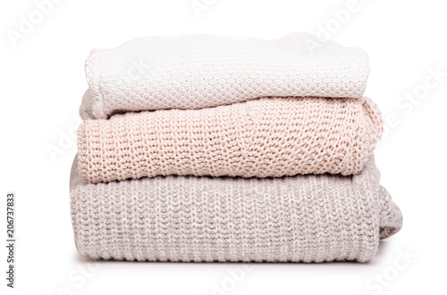 Folded sweater textile on white background isolation