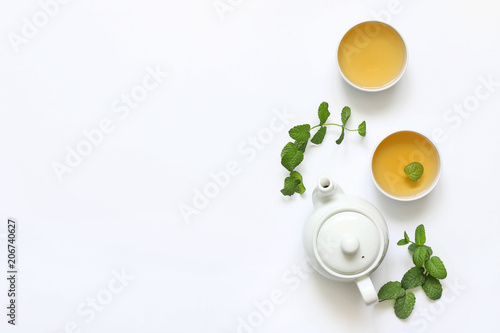 Herbal tea from mint and other herbs on a white background. T