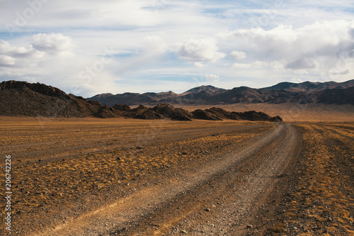 Road through the steppe and mountains of Western Mongolia.