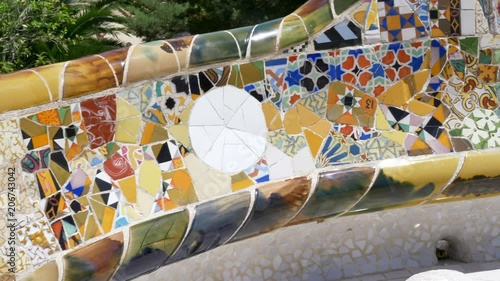 Details of The famous bench mosaics at the Park Güell by arquitect Gaudi in Barcelona, Spain - Slow motion (60fps)