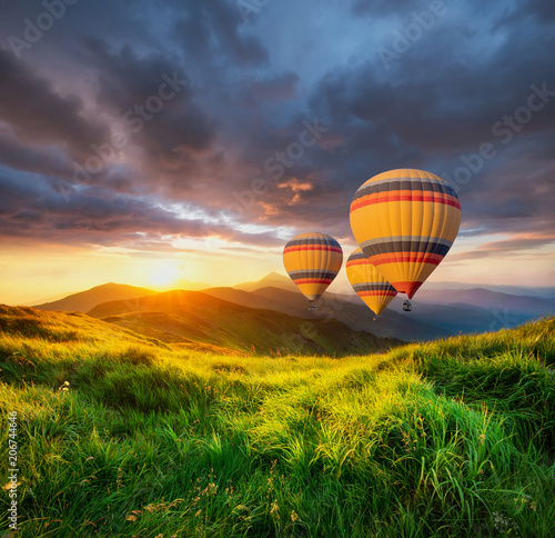 Air ballon above mountains at the summer time. Concept and idea of adventure