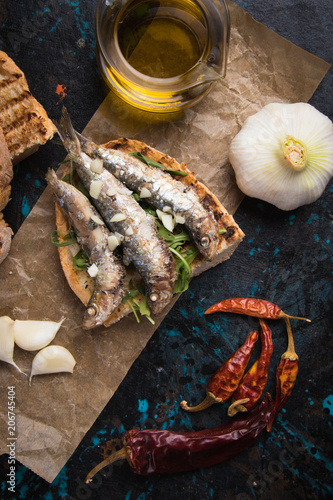 Sardine fish sandwich with garlic and olive oil