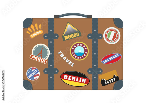 Vector suitcase for travel. Plastered with emblems.