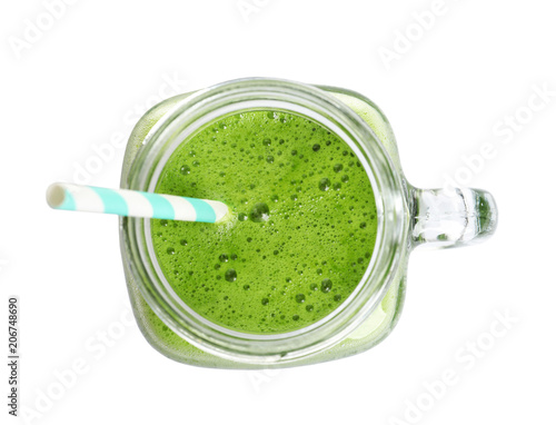 Mason jar with delicious detox juice on white background, top view