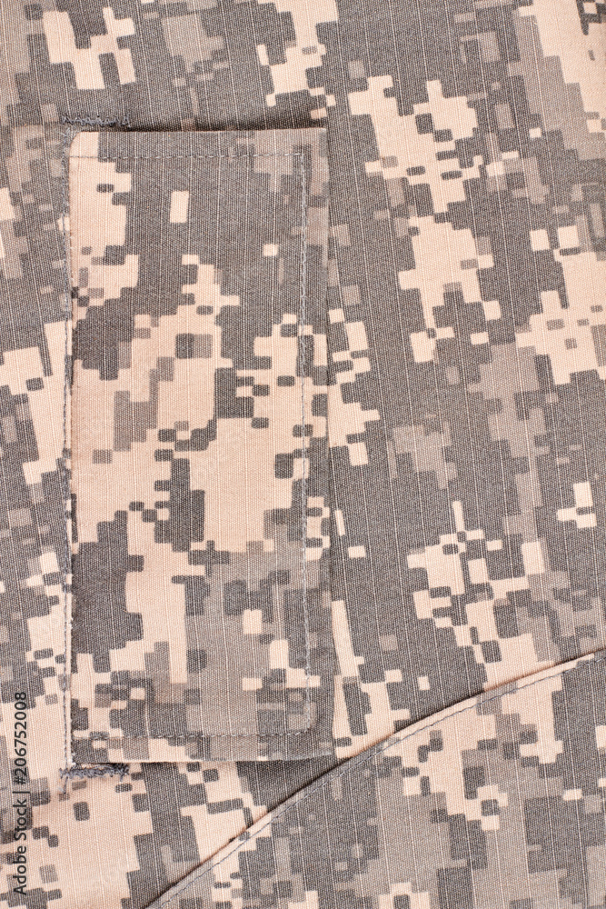 Fototapeta premium Camouflage clothes texture. Military clothes background. Close up.