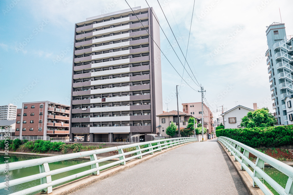 Naka river and modern buildings in Fukuoka, Japan