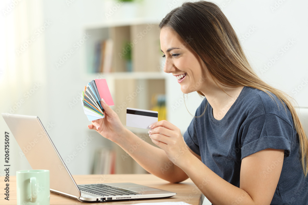 Shopper buying online with multiple credit cards Shopper buying online with multiple credit cards