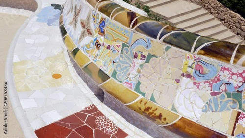 Details of The famous bench mosaics at the Park Güell by arquitect Gaudi in Barcelona, Spain - Slow motion (60fps)