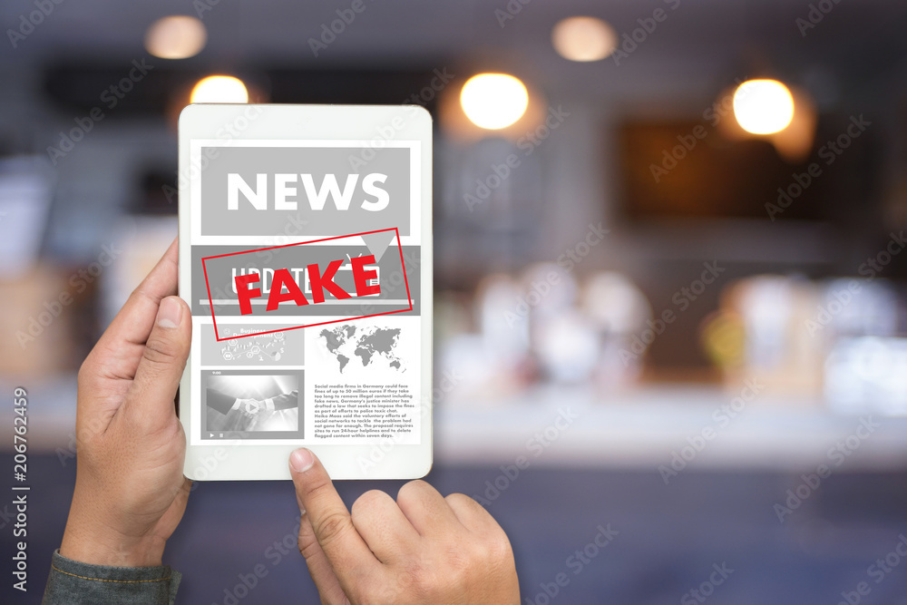 Fake news concept man reading news media technology on smartphone just Fake