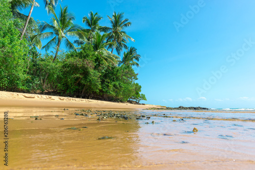 Isolated paradise beach with sunny beautiful day