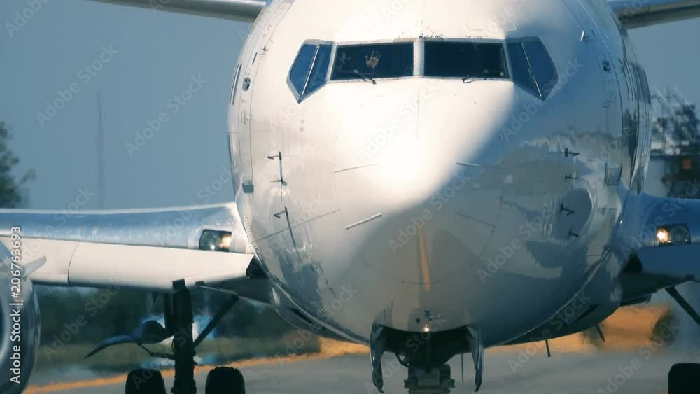 Airplane maneuvers the taxiway before take off Airplane maneuvers the taxiway before take off
