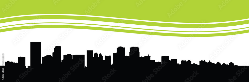 Fototapeta premium Skyline silhouette of the downtown financial district of Calgary, Alberta, Canada.