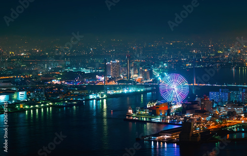 Aerial view of the Osaka Bay harbor area with the ferris wheel at night