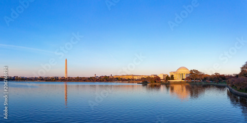 Jeffeerson Memorial and Washington Monument reflected on Tidal Basin in the evening  Washington DC  USA. Panoramic image