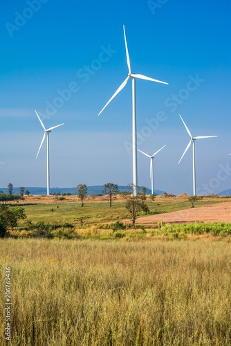 Wind turbines generating electricity with blue sky