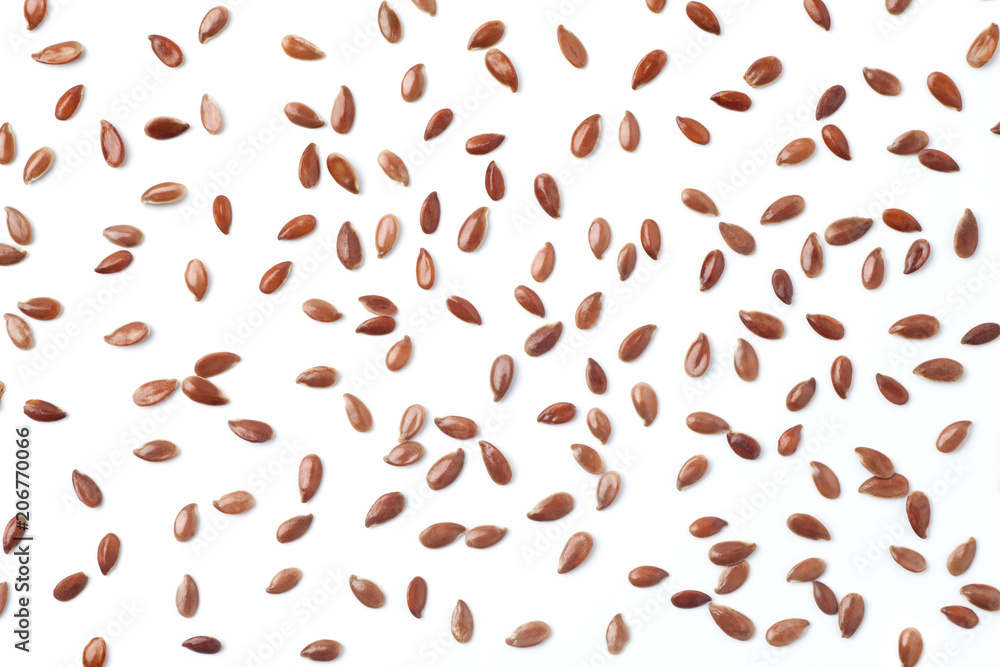Brown flax seeds on white background - obrazy, fototapety, plakaty 