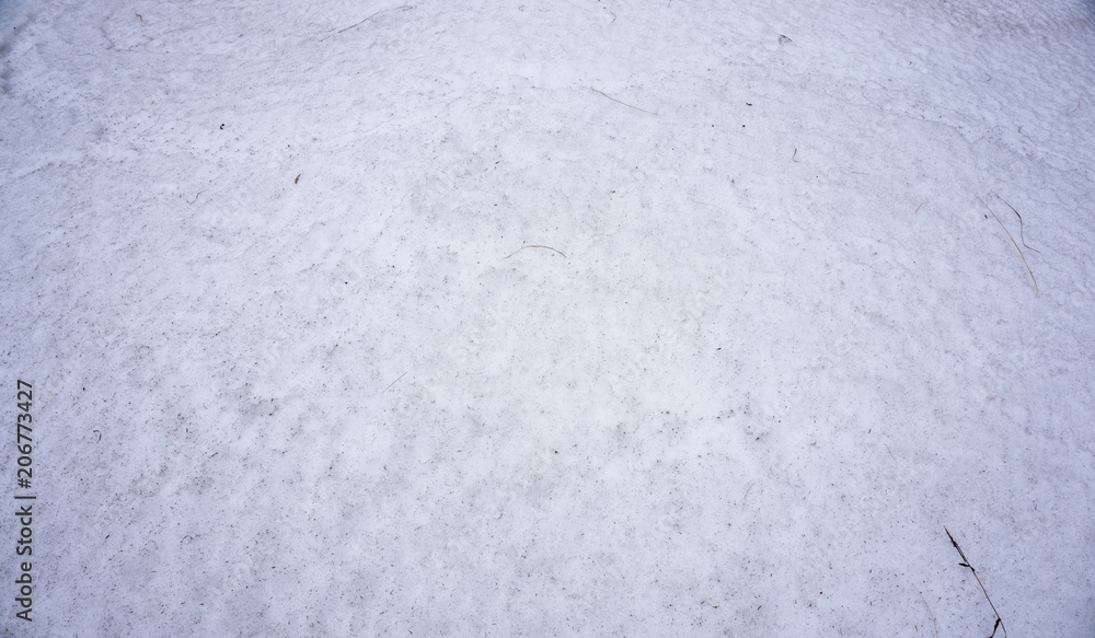 Surface of ground covered with snow in winter