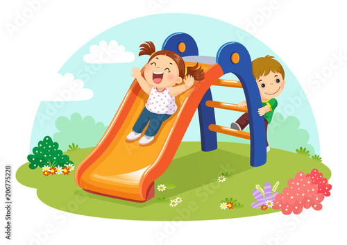 Cute kids having fun on slide in playground