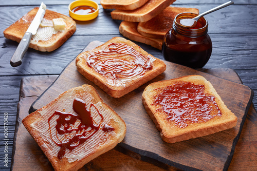 savory toasts with butter and yeast extract photo