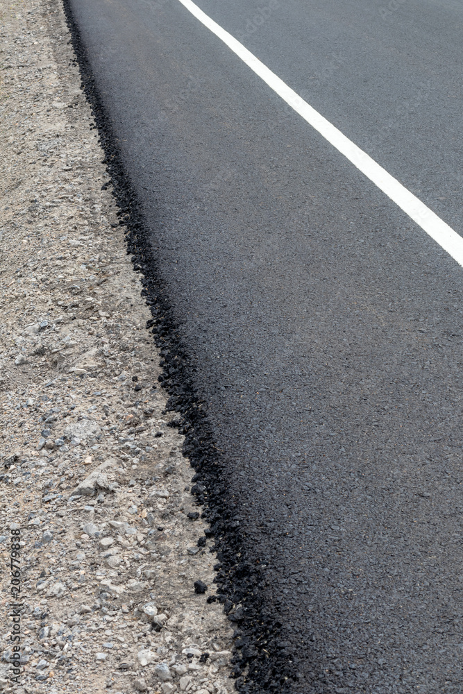 Asphalt Road Surface on Concrete Gravel.