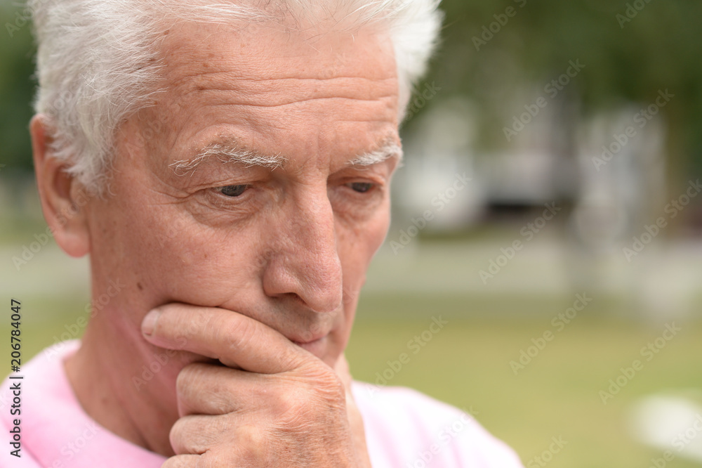 portrait of thoughtful senior man portrait of thoughtful senior man