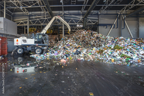 Plastic bales at the waste processing plant. Separate garbage collection. Recycling and storage of waste for further disposal. Business for sorting and processing of waste.