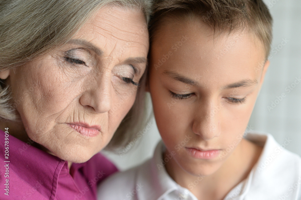 Sad senior grandmother with grandson Sad senior grandmother with grandson