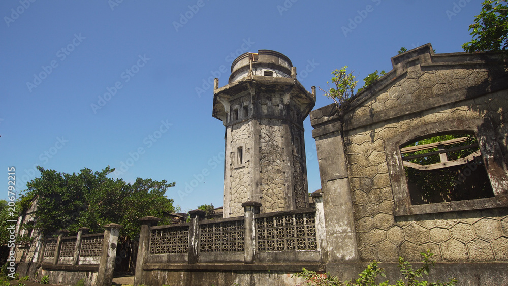 lighthouse in Palau island. Lighthouse in cape Engano against blue sky, province of Cagayan, Philippines.
