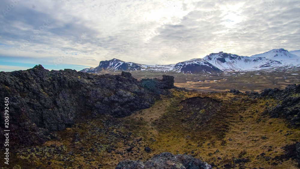 Iceland volcanice landscape meadow field and volcano crater