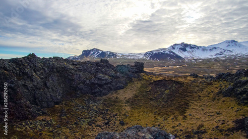 Iceland volcanice landscape meadow field and volcano crater