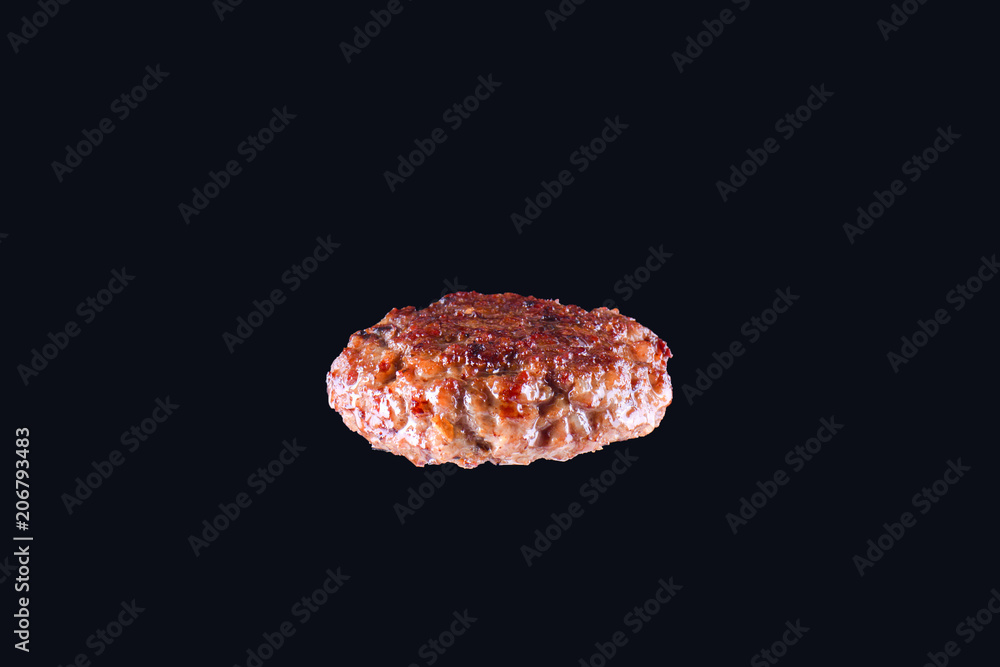 Fried fresh large beef burger isolated on white background. Grilled burger cutlet isolated on black Fried fresh large beef burger isolated on white background. Grilled burger cutlet isolated on black