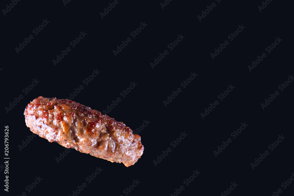 Fried fresh large beef burger isolated on white background. Grilled burger cutlet isolated on black Fried fresh large beef burger isolated on white background. Grilled burger cutlet isolated on black