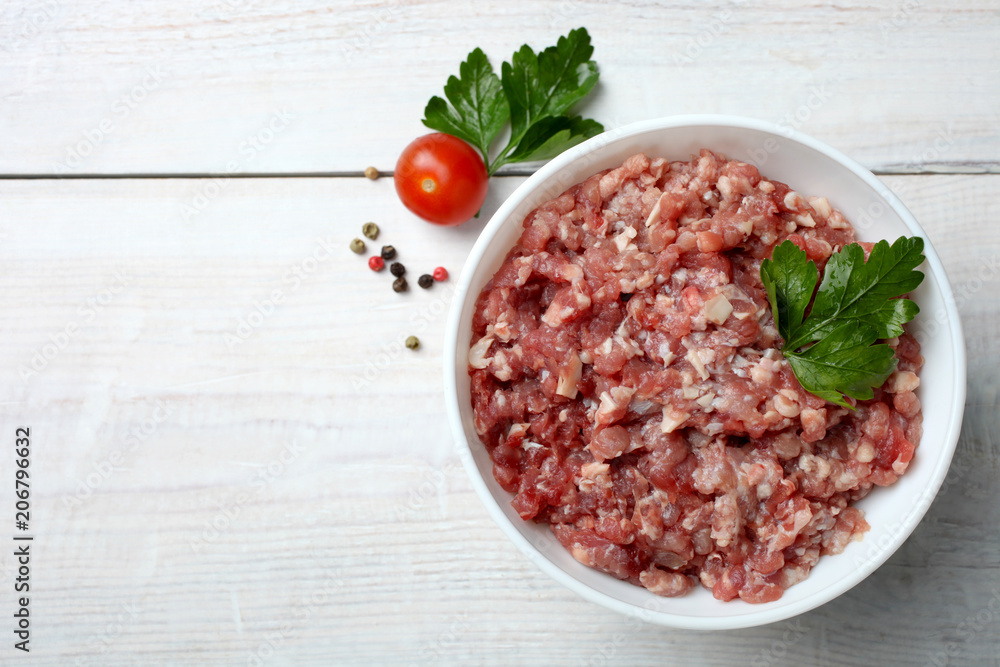 Minced meat in a white bowl Minced meat in a white bowl