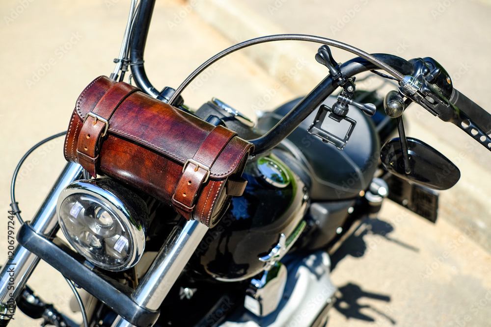 motorcycle choppermotorcycle chopper with leather handbag on the steering wheel motorcycle choppermotorcycle chopper with leather handbag on the steering wheel