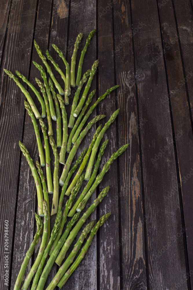 on a wooden table vegetables asparagus on a wooden table vegetables asparagus