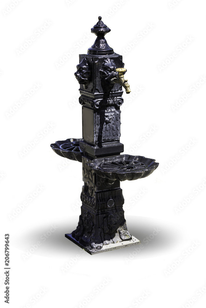 Obraz premium Pulpulak covered with black paint. Copper water tap. Isolated image on a white background.