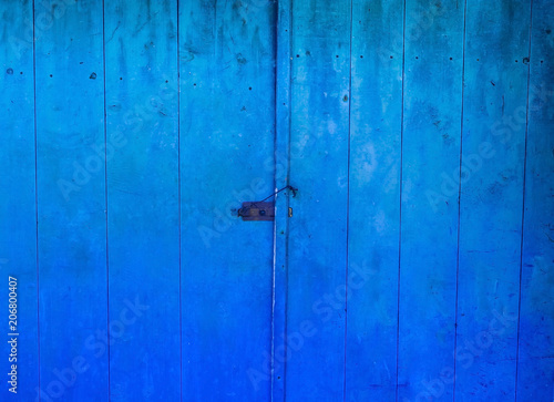 saturated blue wooden background of natural wood, concept of natural materials, closeup, copy space, © Nataliia