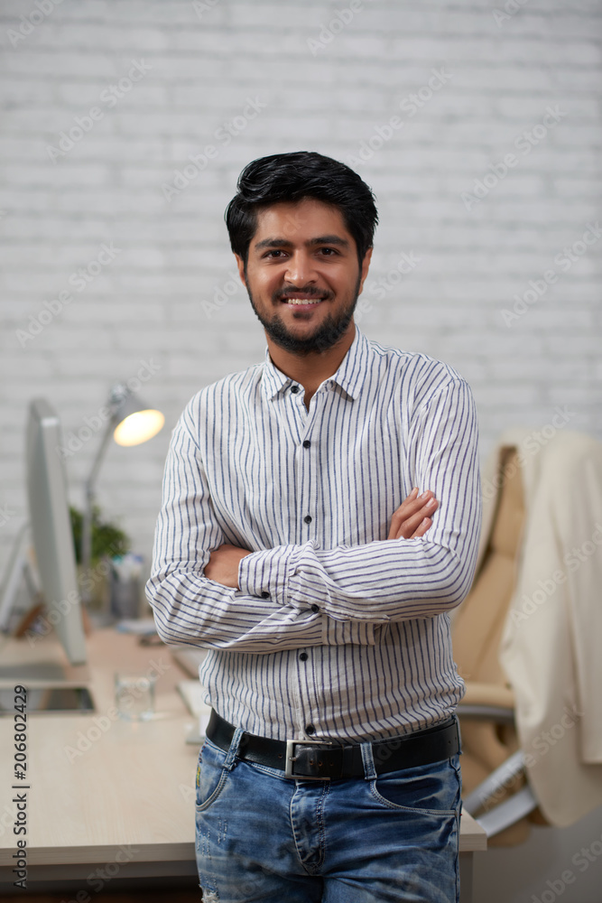 Fototapeta premium Smiling young businessman