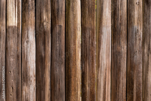 Brown soft wood surface as background, wooden texture planks.