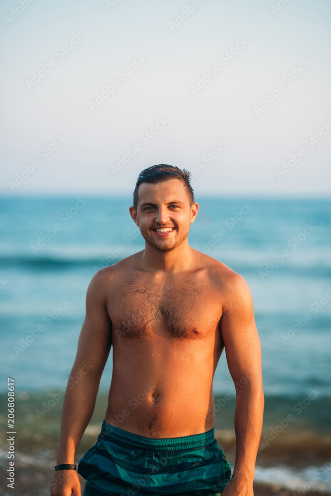 Portrait of an attractive young man on a tropical beach Portrait of an attractive young man on a tropical beach